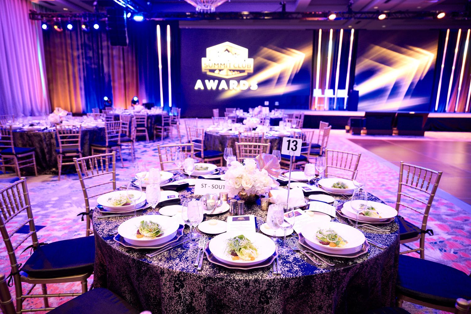 Awards dinner room under purple light