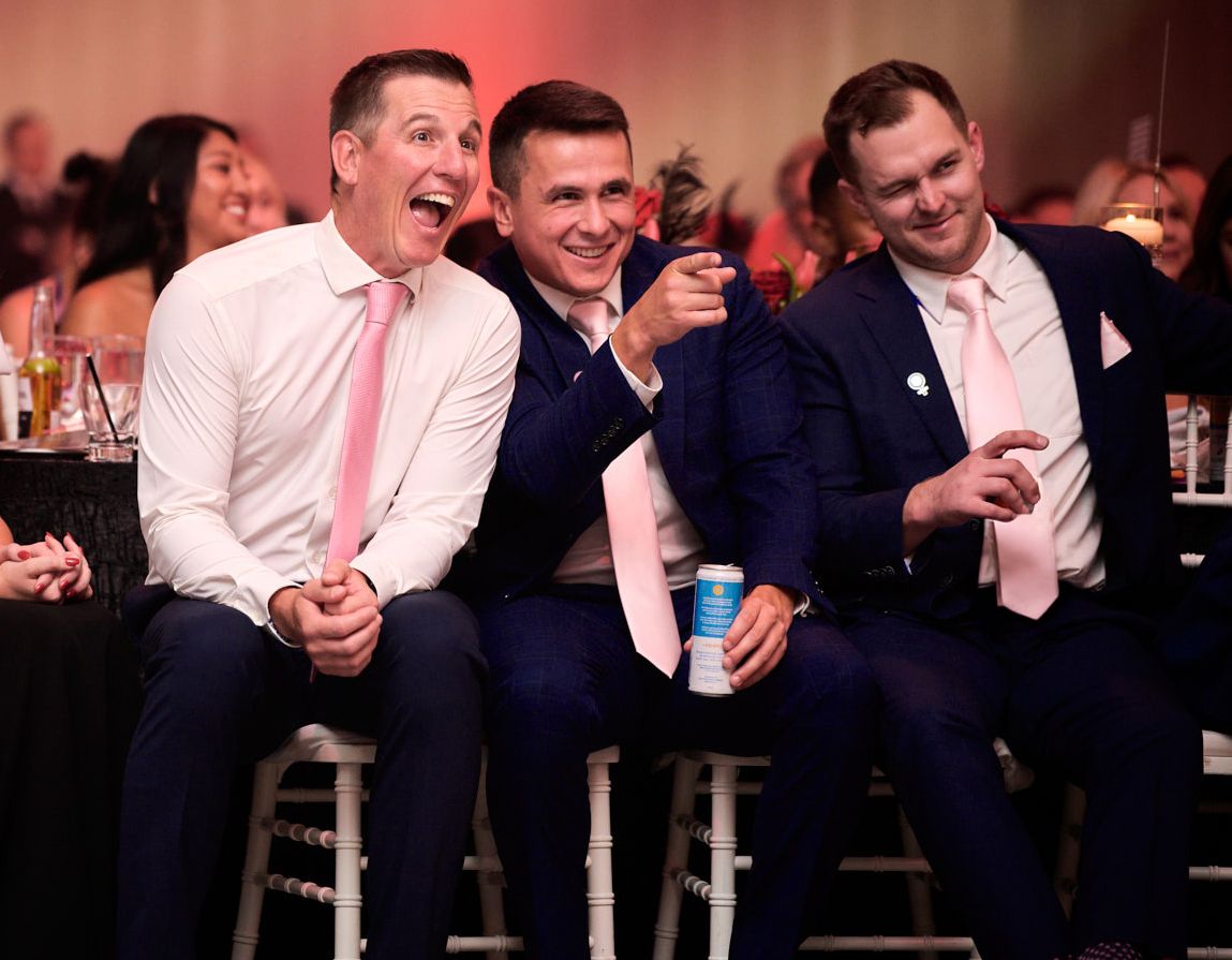Award winners cheering from their table