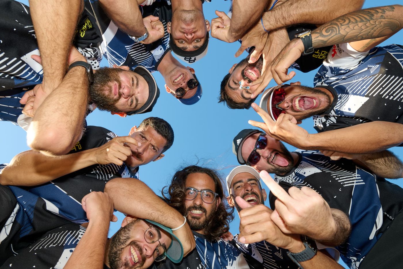 Team huddle shot from below