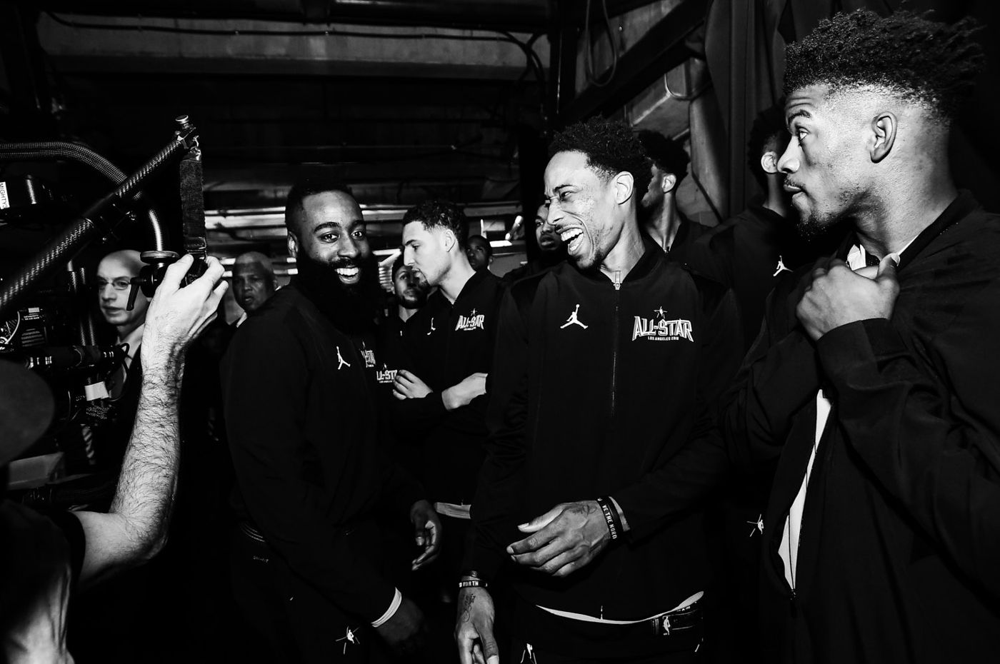 All-Star players laughing in the tunnel